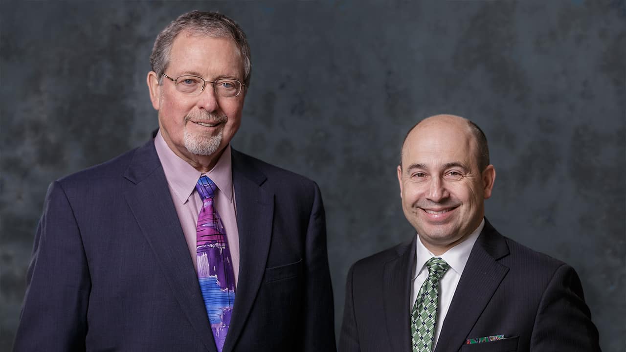 J. Timothy Esper & Mark A. Aiello